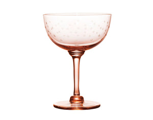 A set of four rose champagne saucers with stars design